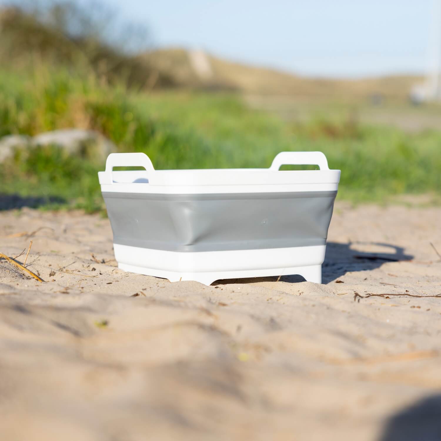 Collapsible Basin with Water Outlet